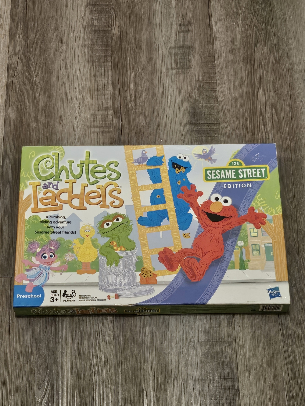 Sesame Street Chutes and Ladders Kids Board Game - Colorful Elmo Edition
